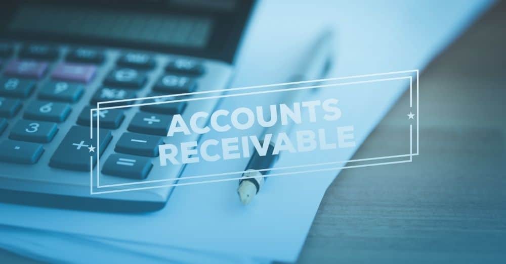 Calculator and pen in background with the words "Accounts Receivable" across the image