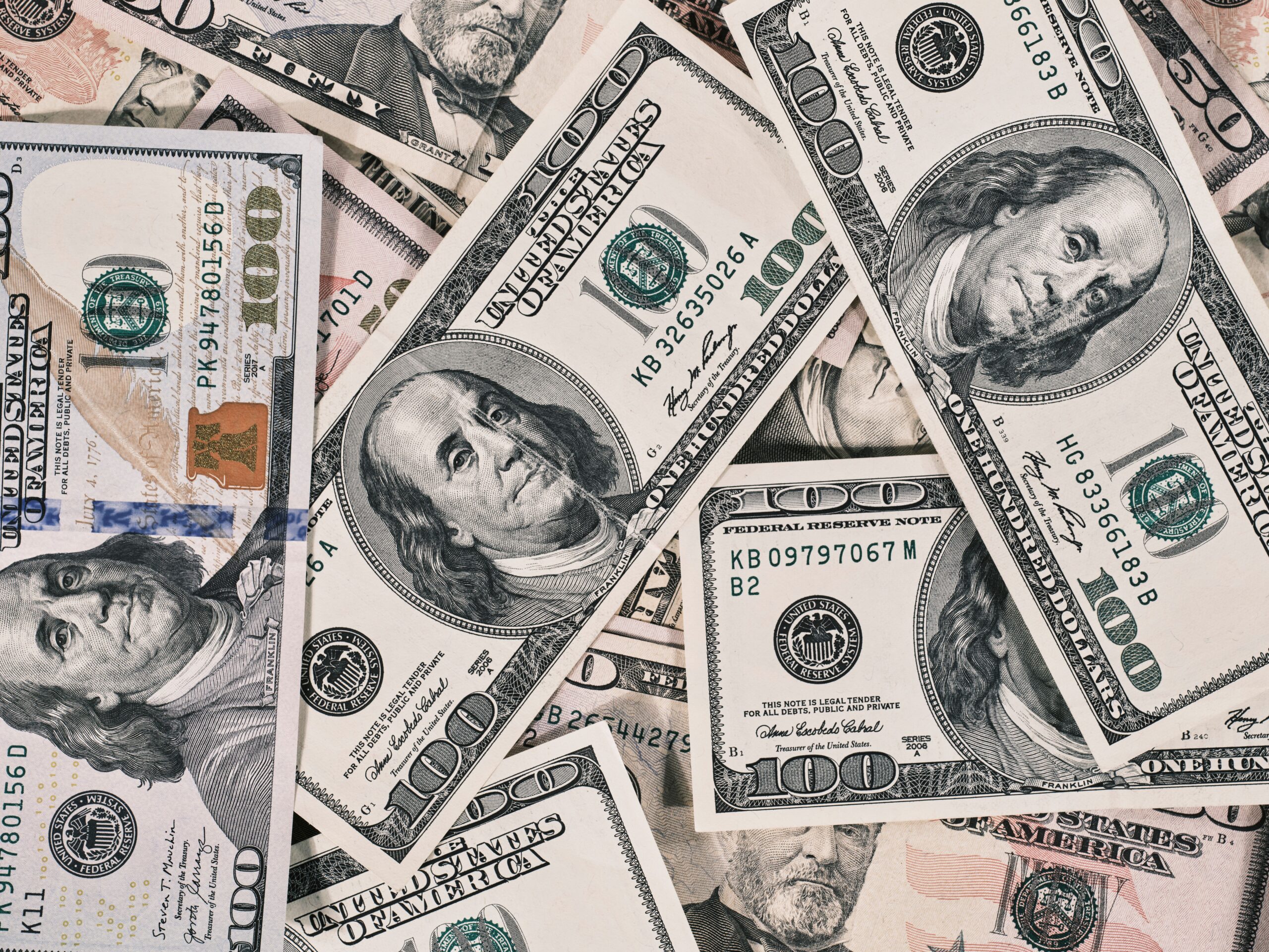 $100 bills with Benjamin Franklin